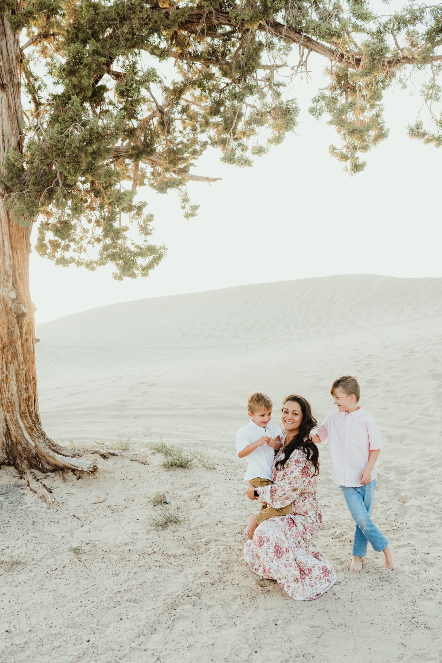 Little Sahara Sand Dunes. Beautiful photos of mom and her sons photographed by Stephanie Lorraine Photography.