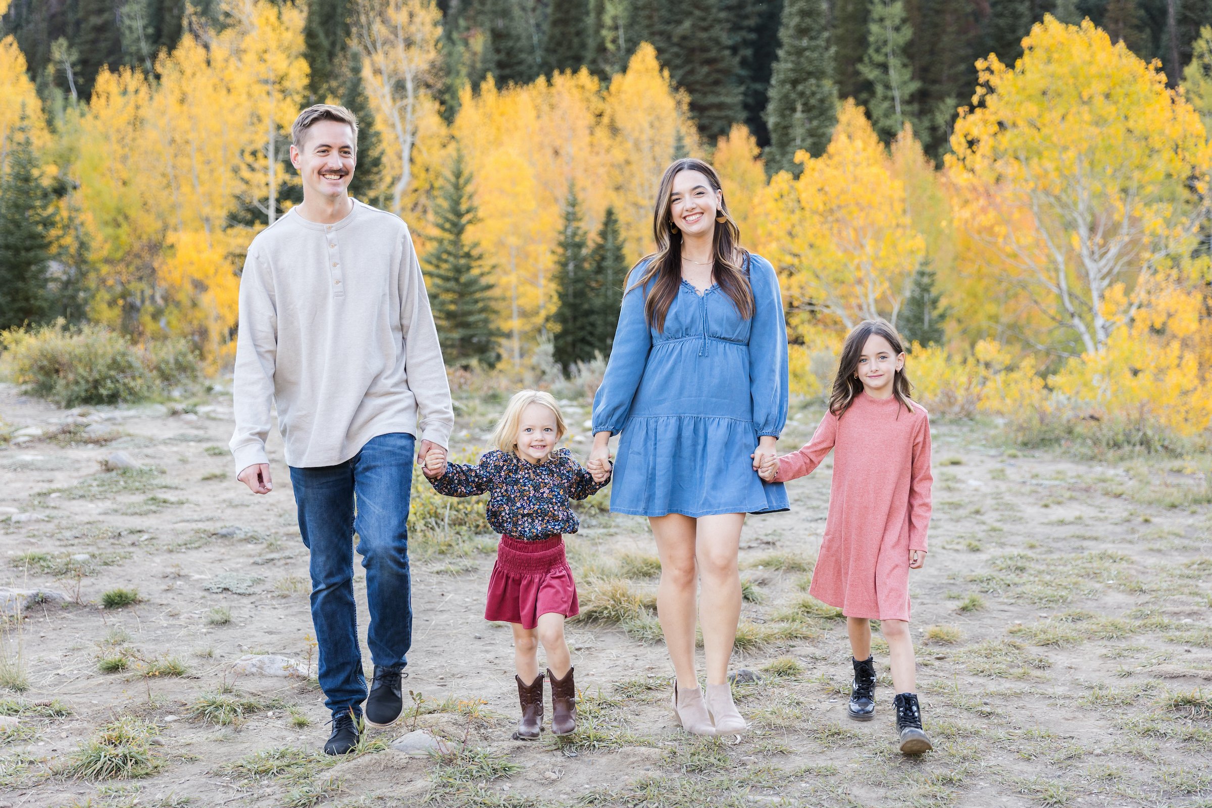 Session in Big Cottonwood Canyon. Beautiful fall colors and gorgeous family photographed by Stephanie Lorraine Photography.