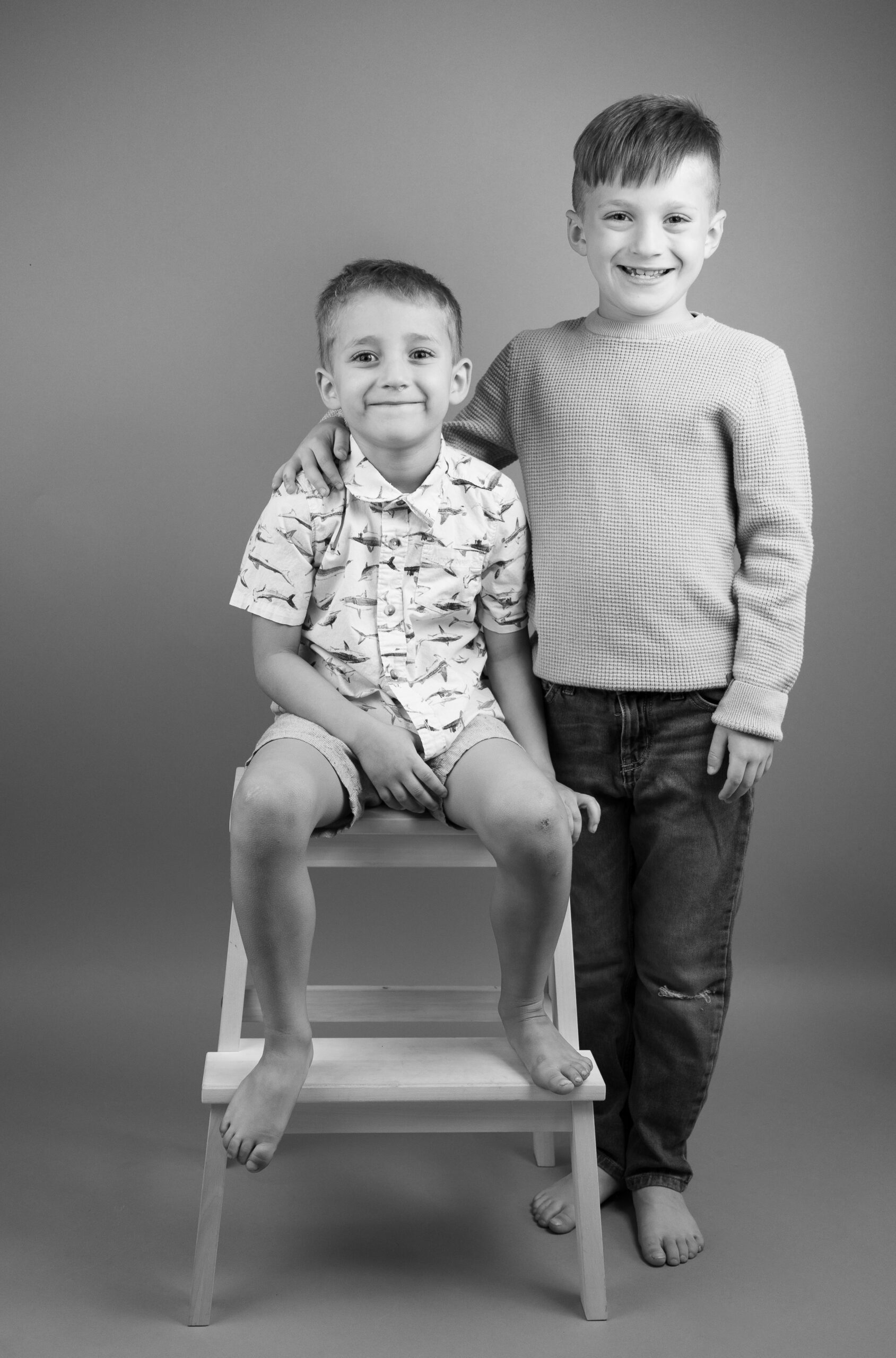 In studio sibling portrait session in Draper, Utah by Utah family photographer.