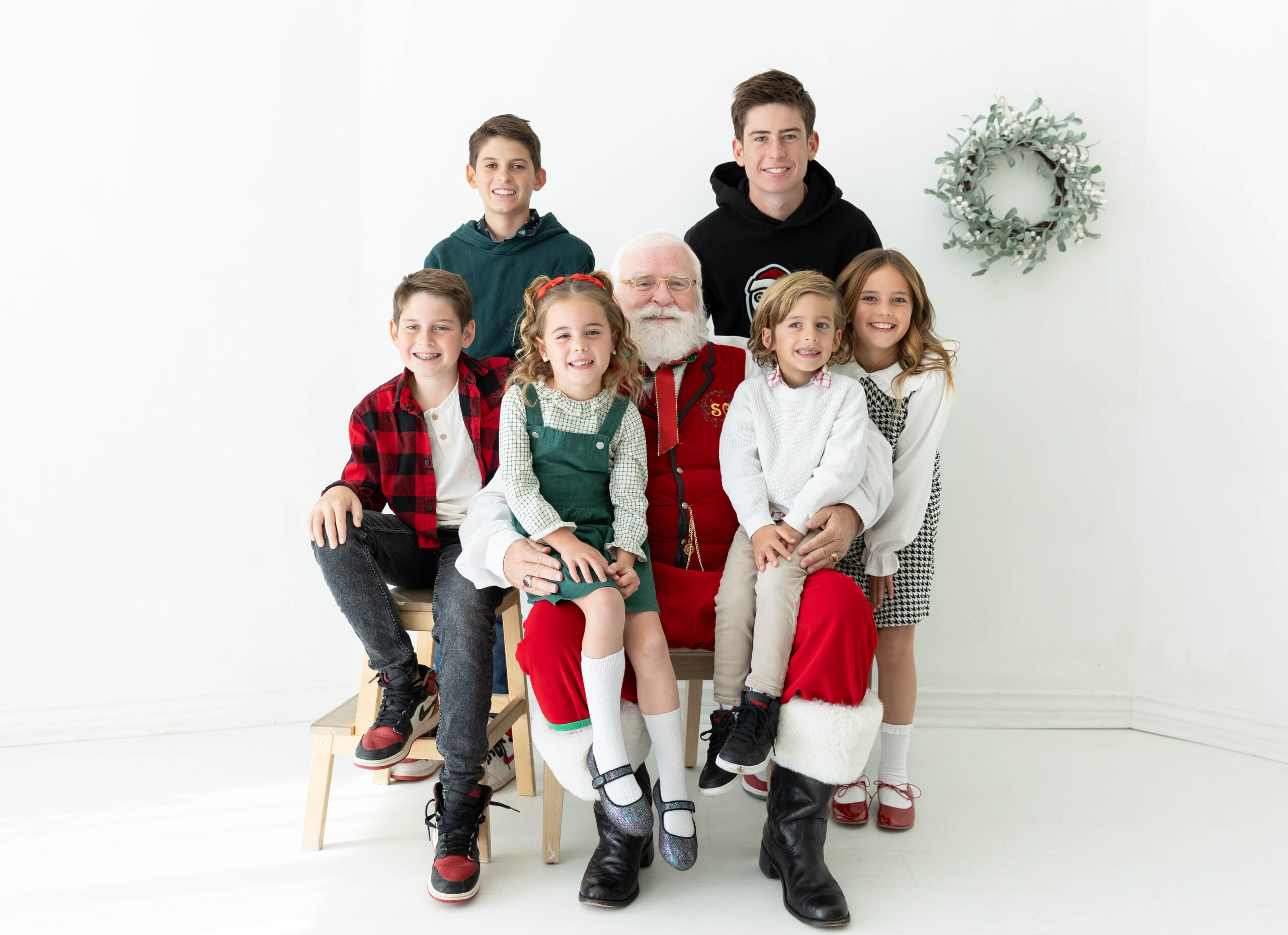 Photo of siblings with Santa in American Fork studio