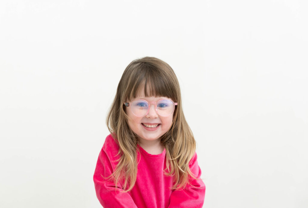 Adorable photo of a child in her glasses