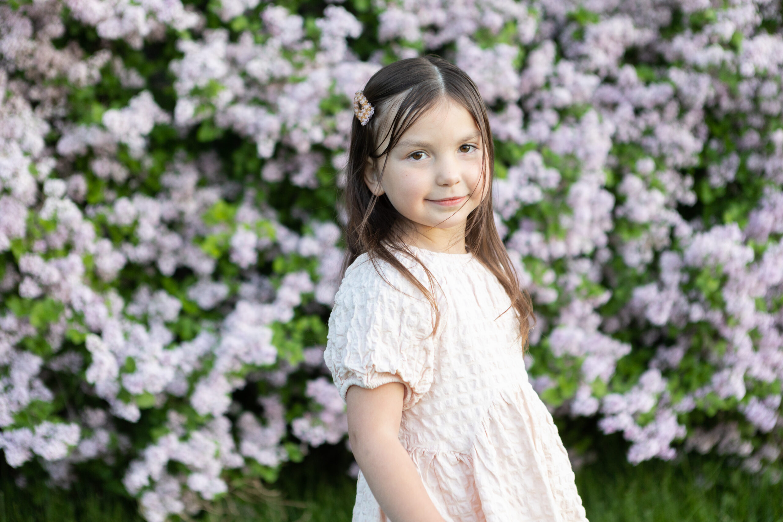 Portrait photo at a lavender wall in West Jordan